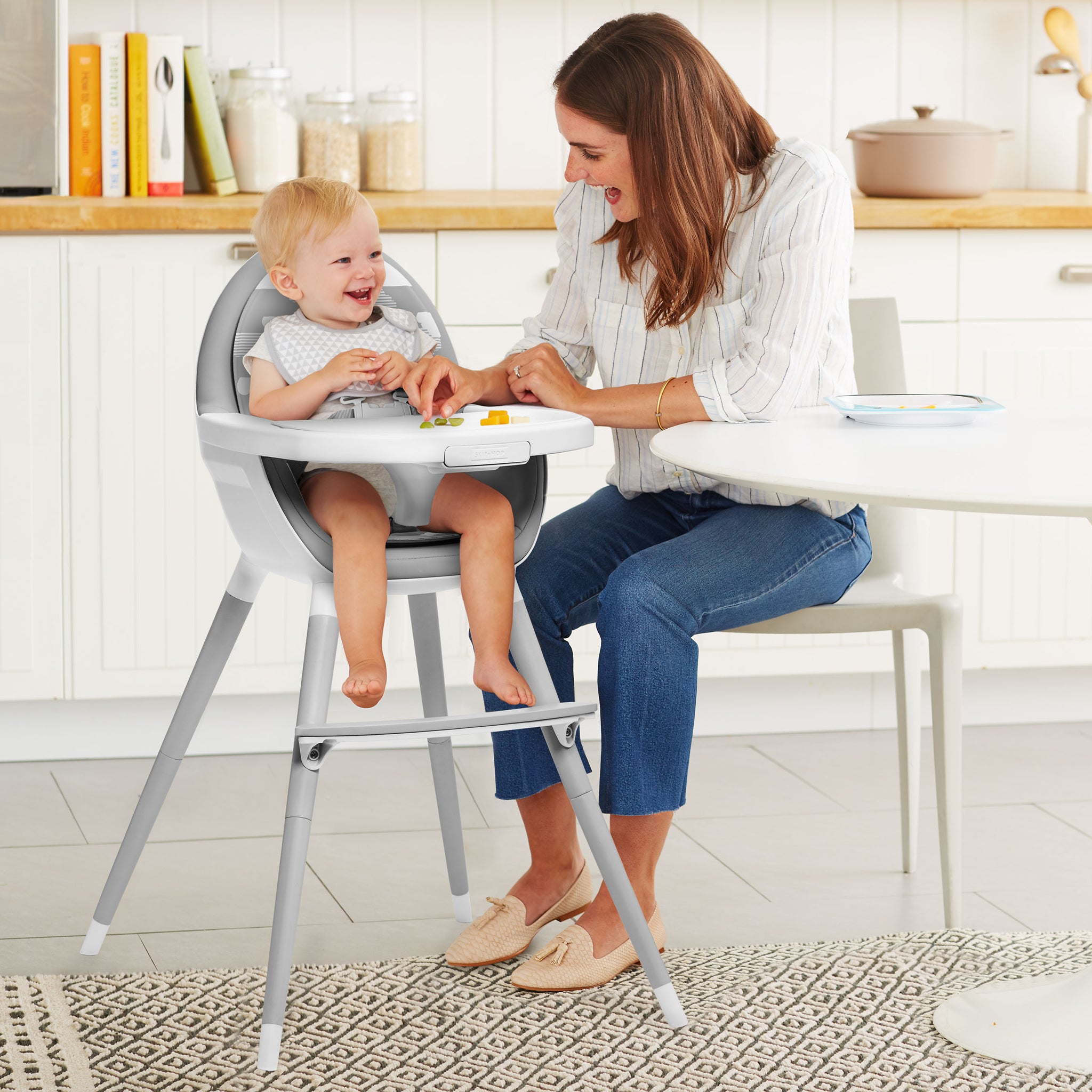 Skip Hop Tuo convertible high chair in grey with clouds pattern