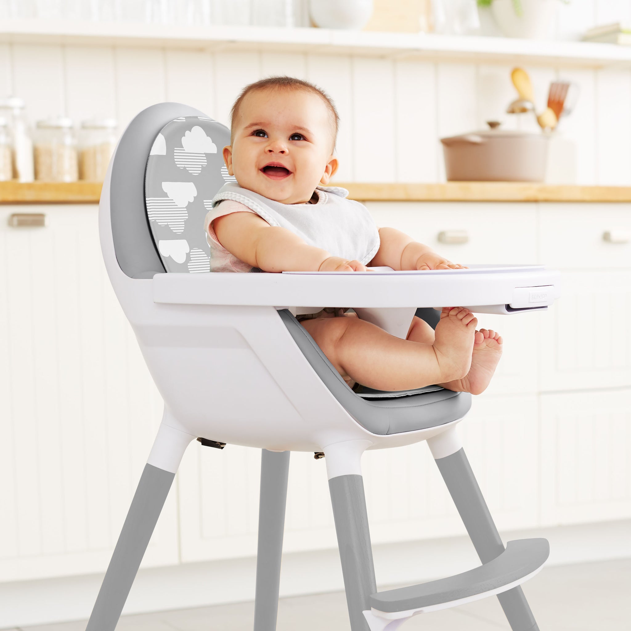 Skip Hop Tuo convertible high chair in grey with clouds pattern